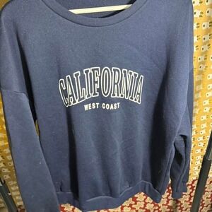 Woman's blue California sweater size Large